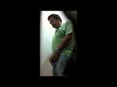 Unaware males are seen urinating, wanking their penis, and more on a hidden public crapper camera.